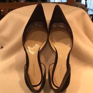 Brown suede and leather pumps.